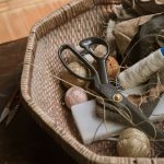 Photo by Mojor Zhu round brown wicker basket